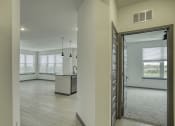 Thumbnail 30 of 47 - an open kitchen and living room with a large window