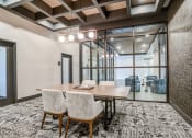Thumbnail 12 of 56 - a conference room with a large table and chairs