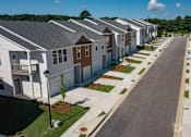 Thumbnail 65 of 71 - a row of houses on a street