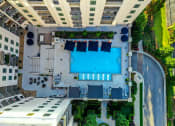 Thumbnail 50 of 58 - arial view of a swimming pool in the middle of a building