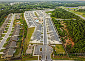 Thumbnail 71 of 71 - an aerial view of a parking lot in a city