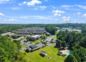 Thumbnail 31 of 35 - an aerial view of a campus with trees and buildings