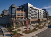 Thumbnail 1 of 40 - an aerial view of a building with a parking lot