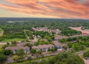 Thumbnail 31 of 31 - an aerial view of a neighborhood with houses and trees