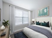 Thumbnail 7 of 36 - a bedroom with a large window and a large bed