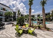 Thumbnail 35 of 47 - Beautifully landscaped outdoor area, perfect for relaxation in Apollo Beach, Florida.