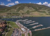 Thumbnail 29 of 43 - an aerial view of the marina at the lake with boats docked in it