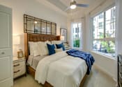 Thumbnail 12 of 34 - a bedroom with a bed and a window at Altis Grand Central, Tampa Florida