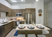 Thumbnail 9 of 34 - a kitchen or kitchenette at locale dallas victory park at Altis Grand Central, Tampa, 33606