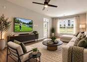 Thumbnail 5 of 25 - A living room with a television, a sofa, a chair, and a coffee table.