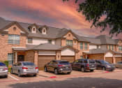 Thumbnail 59 of 69 - a row of cars parked in front of a house
