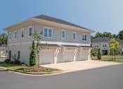 Thumbnail 67 of 67 - A two-story house with a garage on the first floor.