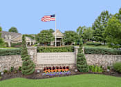 Thumbnail 1 of 37 - The sign in front of the building says "Greystone Summit Apartment Community".