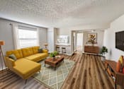 Thumbnail 16 of 38 - A living room with a yellow sofa and a wooden floor.