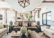 Thumbnail 3 of 37 - a living room with a couch and a coffee table