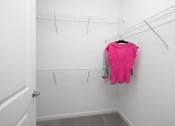 Thumbnail 9 of 23 - a walk in closet in a 555 waverly unit