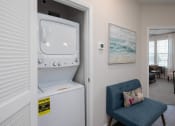 Thumbnail 10 of 23 - a washer and dryer are available in the living room