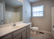 Thumbnail 6 of 26 - a bathroom with a sink toilet and bathtub