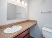Thumbnail 15 of 25 - a bathroom with a sink and a toilet