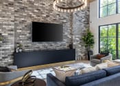 Thumbnail 6 of 22 - a living room filled with furniture and a large flat screen tv at Leena Plantation, Florida, 33322