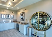 Thumbnail 11 of 27 - a large glass display case in the corner of a room with a sink and a trash can