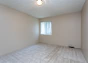 Thumbnail 15 of 41 - an empty room with a chandelier
