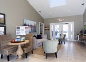 Thumbnail 5 of 31 - a living room with a couch and a table