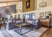 Thumbnail 4 of 34 - a living room with couches and chairs and a table at L'Estancia, Sarasota, FL, 34231