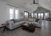 Thumbnail 21 of 27 - a living room filled with furniture and a large window