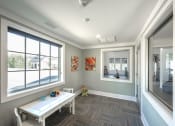 Thumbnail 12 of 54 - a conference room with a white table and a large window