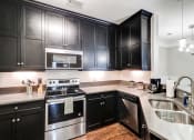 Thumbnail 24 of 43 - kitchen with stainless steel appliances