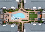 Thumbnail 36 of 41 - a birds eye view of a building with a swimming pool
