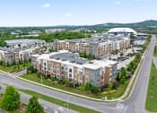 Thumbnail 41 of 41 - an aerial view of an apartment complex on a city street