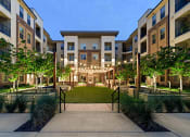 Thumbnail 37 of 41 - an exterior view of an apartment complex with a green courtyard