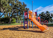 Thumbnail 25 of 32 - A playground with a slide and a climbing frame L'Estancia, Sarasota, FL, 34231
