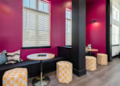 Thumbnail 38 of 49 - A room with a pink wall and a black column.