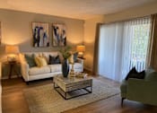 Thumbnail 2 of 21 - Entertain guests in an open concept living room at Lake in the Woods, Melbourne, Florida