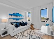 Thumbnail 20 of 78 - a living room with a white couch and a large window at Altis Blue Lake, Florida, 33467