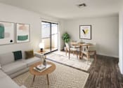 Thumbnail 2 of 30 - A living room with a white couch, a wooden coffee table, and a dining table with chairs.