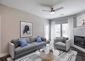 Thumbnail 1 of 37 - A living room with a grey couch, a coffee table, and a painting on the wall.