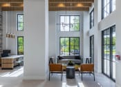 Thumbnail 4 of 22 - a large living room with high ceilings and large windows at Leena Plantation, Plantation, 33322
