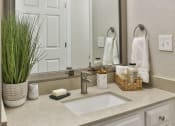 Thumbnail 17 of 27 - a bathroom with a sink and a mirror at Crestmont at Thornblade, Greenville, SC