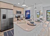 Thumbnail 16 of 78 - model kitchen at Altis Blue Lake, Lake Worth