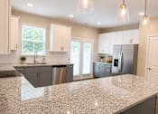 Thumbnail 11 of 71 - kitchen with natural stone countertops