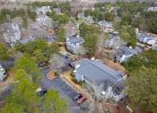 Thumbnail 42 of 44 - an aerial view of a neighborhood with houses and trees