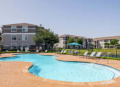 Thumbnail 18 of 33 - our apartments offer a swimming pool in front of our building at Orion Prosper, Prosper, TX, 75078