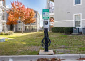Thumbnail 26 of 33 - a parking meter in front of an apartment building  at Orion Prosper, Texas, 75078