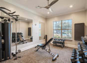 Thumbnail 11 of 33 - a workout room with weights and cardio equipment and a window at Orion Prosper, Prosper, TX, 75078