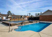 Thumbnail 10 of 26 - the swimming pool at the whispering winds apartments in pearland, tx