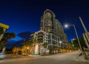 Thumbnail 12 of 14 - a city street at night with a tall building in the background at Regatta at New River, Fort Lauderdale Florida
